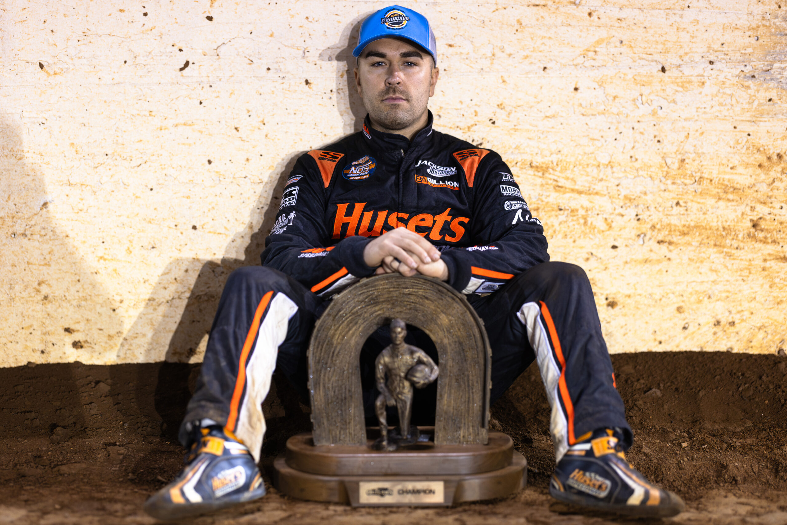 David Gravel sits with the 2024 championship trophy in front of him