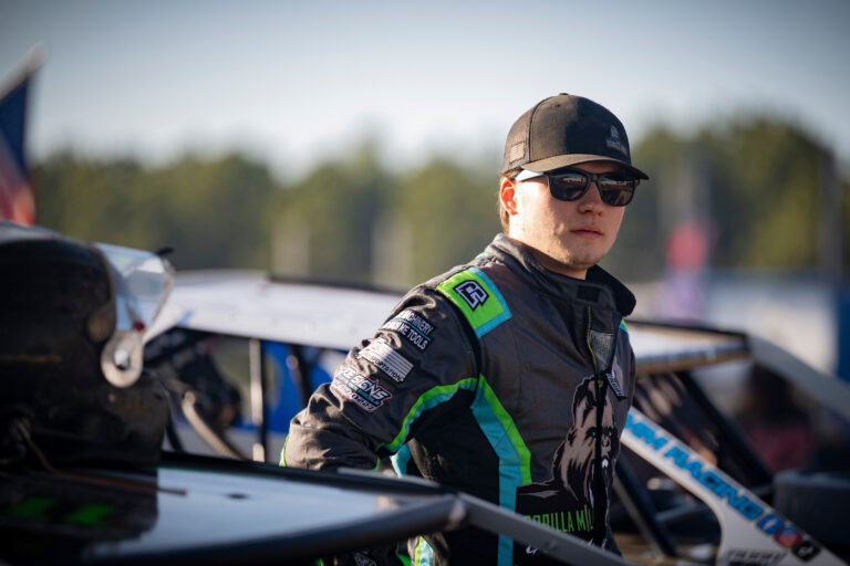 Jake Timm outside car