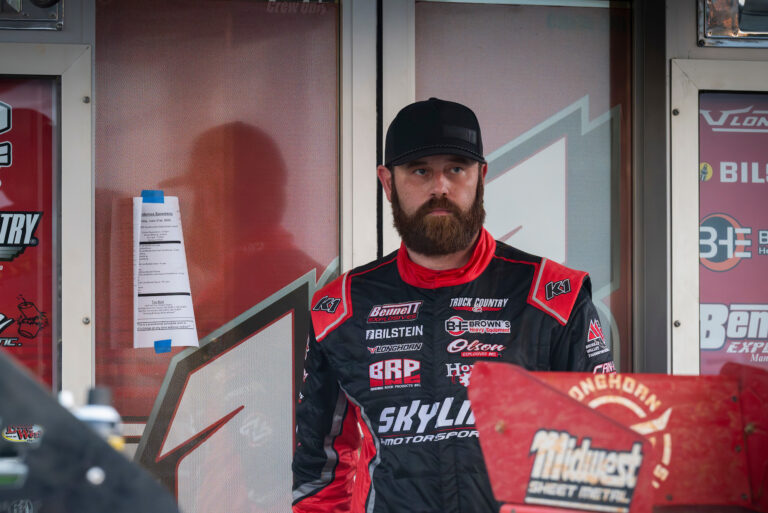Tyler Bruening outside hauler