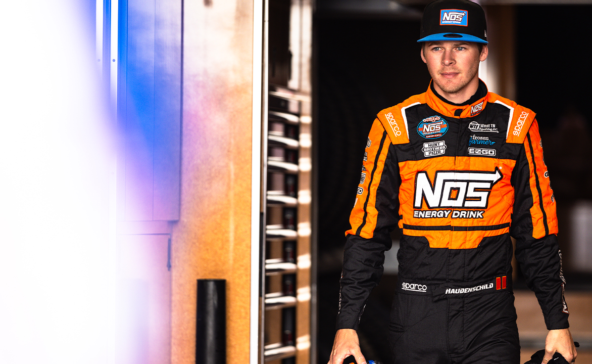 Sheldon Haudenschild walking in the Stenhouse Jr.-Marshall Racing hauler