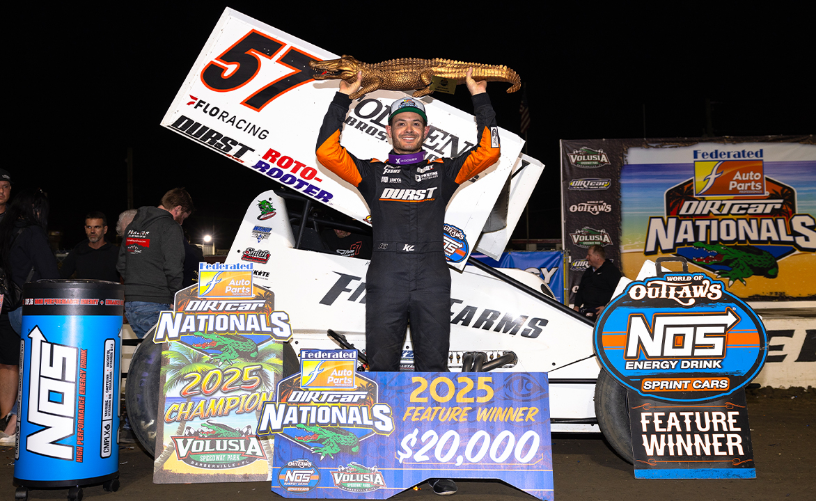 Kyle Larson lifts the Big Gator trophy