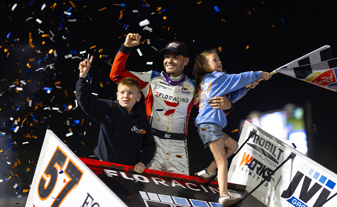 Kyle Larson celebrates with his kids Owen and Audrey