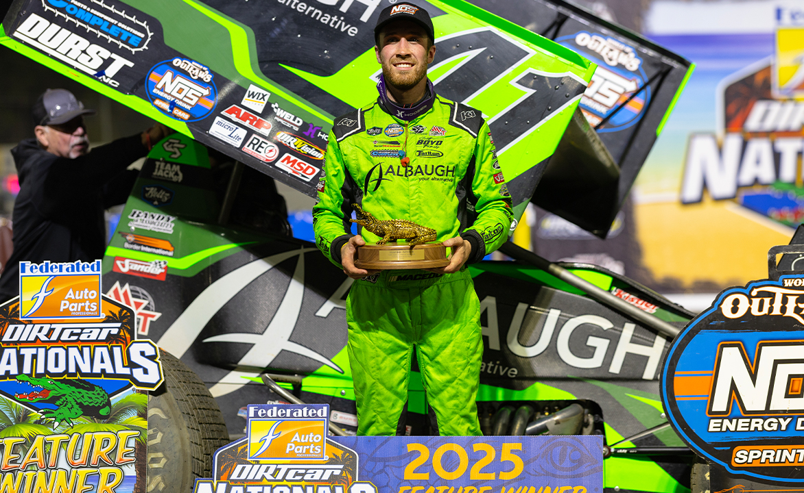 Carson Macedo holds the gator trophy