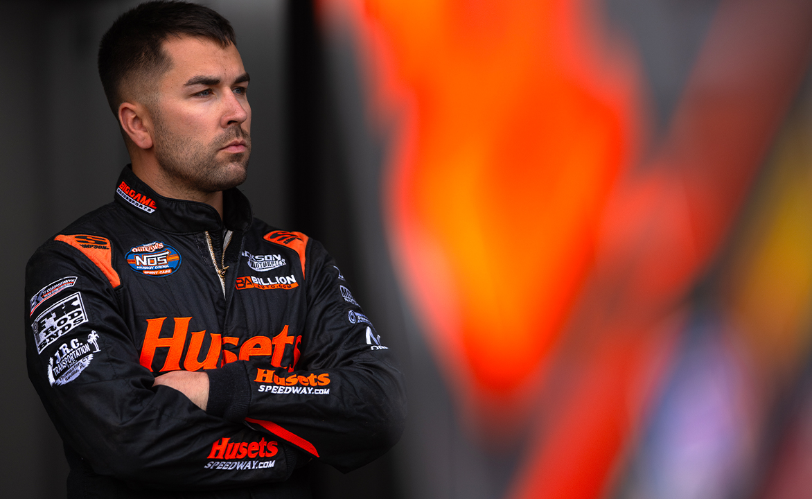 David Gravel stands in the Big Game Motorsports hauler