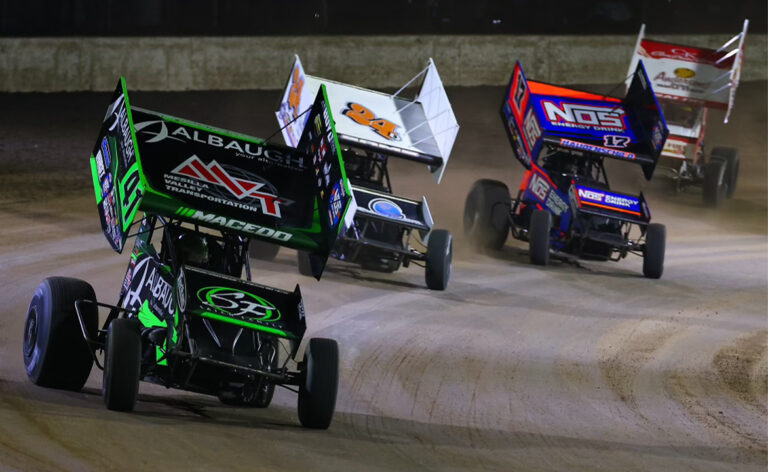 Carson Macedo, Danny Sams III, Sheldon Haudenschild, and Bill Balog racing.