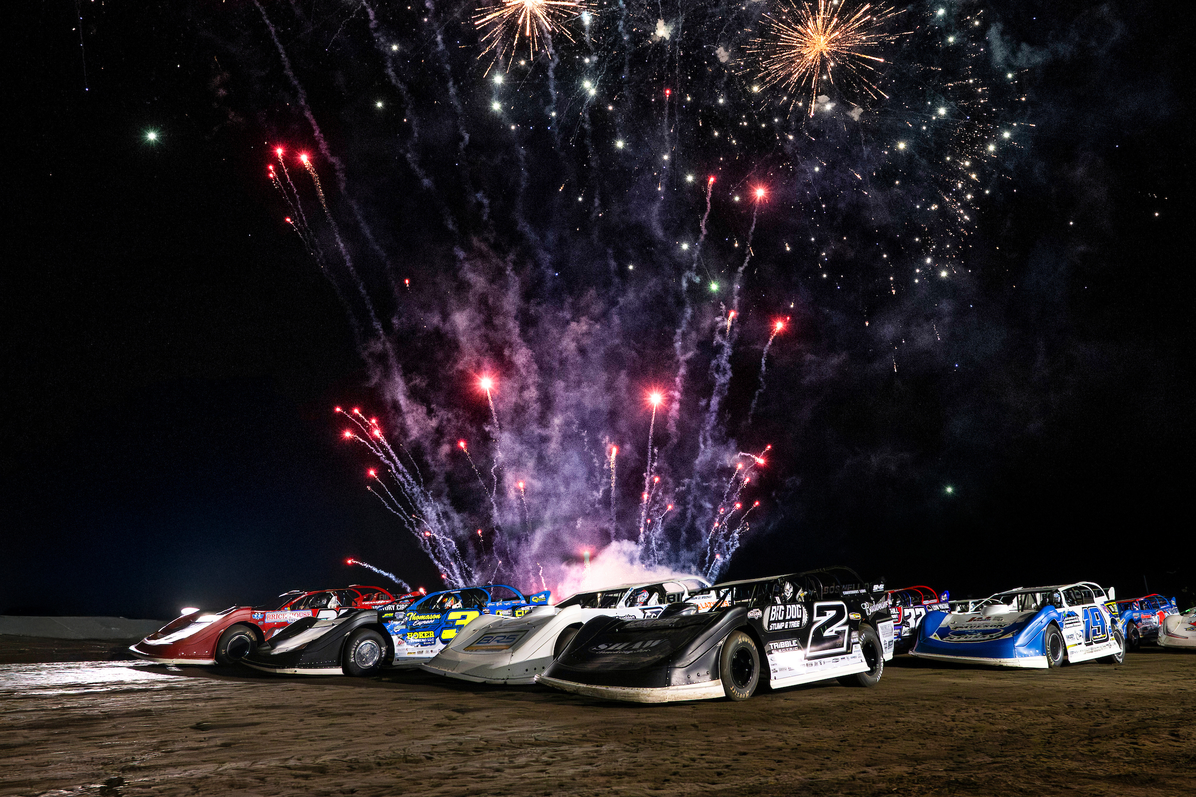 Cars 4 wide with fireworks