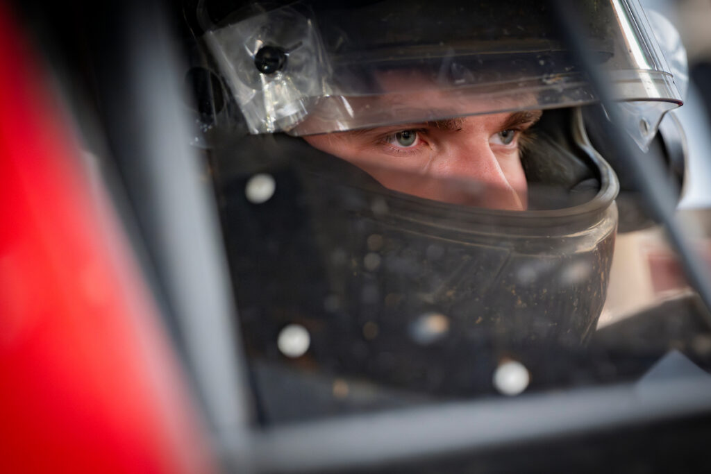 Troutman sitting in car