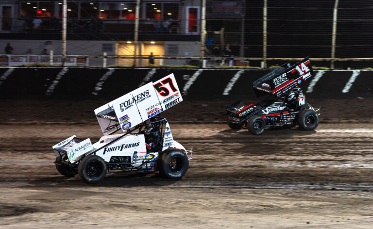 Kyle Larson races ahead of Spencer Bayston
