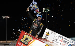 Bill Balog celebrating at Perris Auto Speedway