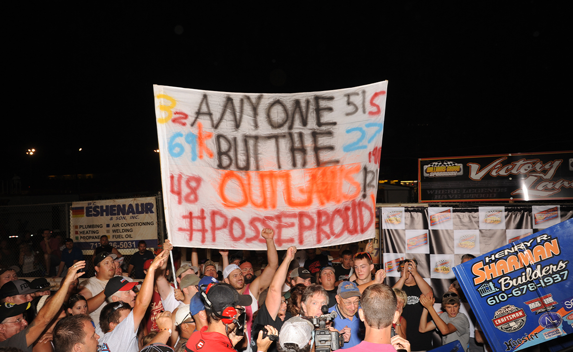 Pennsylvania Posse fans hold up a banner in Williams Grove Speedway Victory Lane