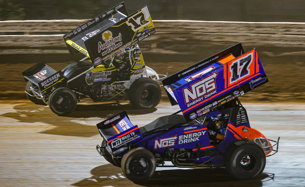 Sheldon Haudenschild races under Bill Balog at Williams Grove Speedway