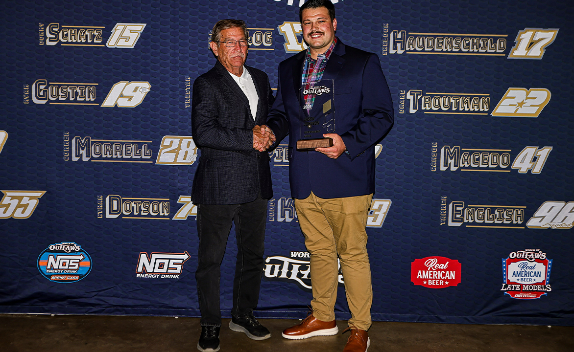 Robby McQuinn being presented the Jason Johnson Sportsmanship Award