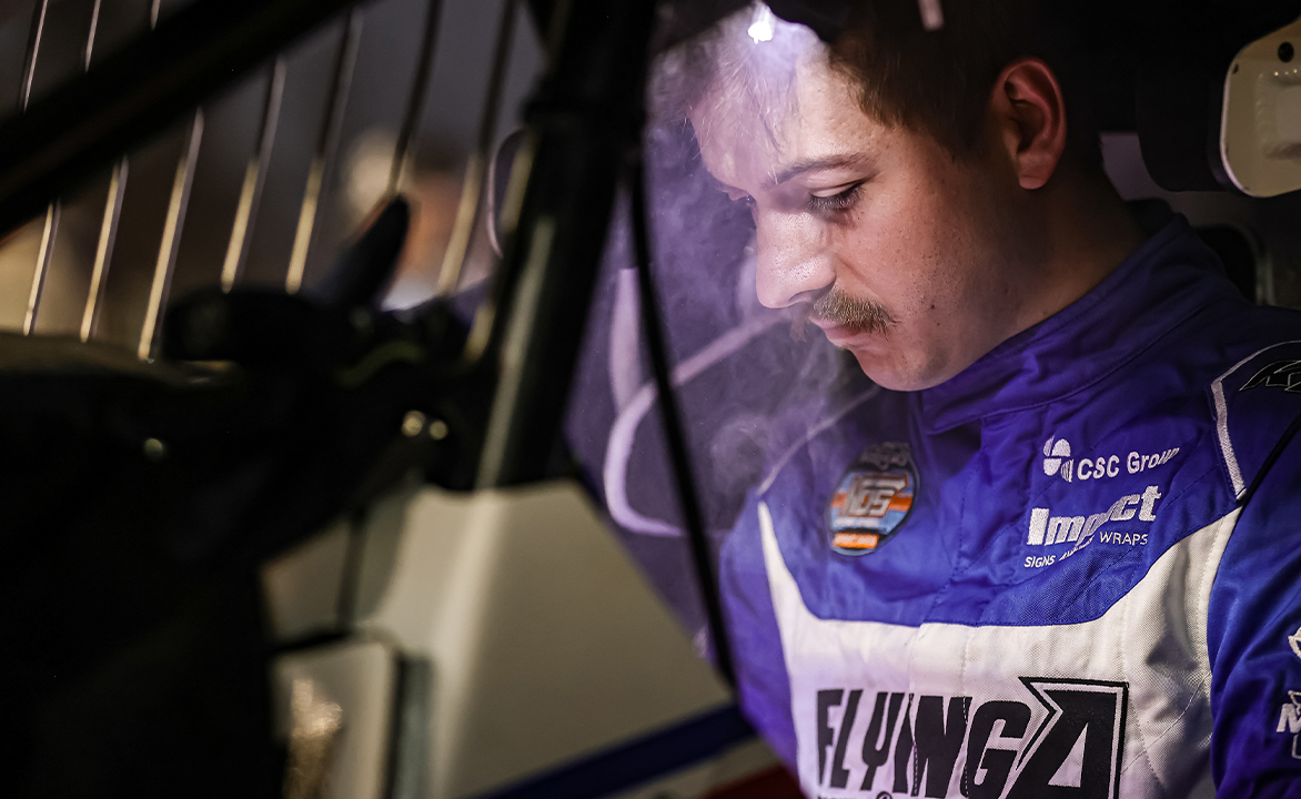 Garet Williamson sitting in the Fischer Motorsports No. 23