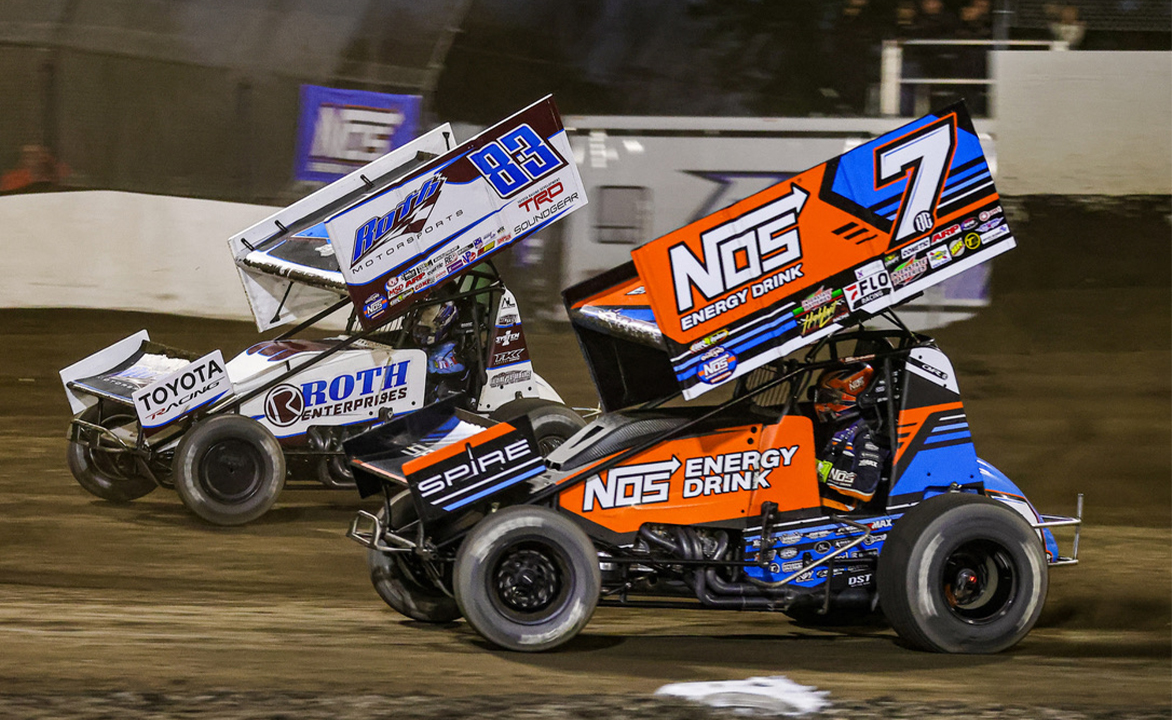 Tyler Courtney races alongside Buddy Kofoid at Tri-State Speedway