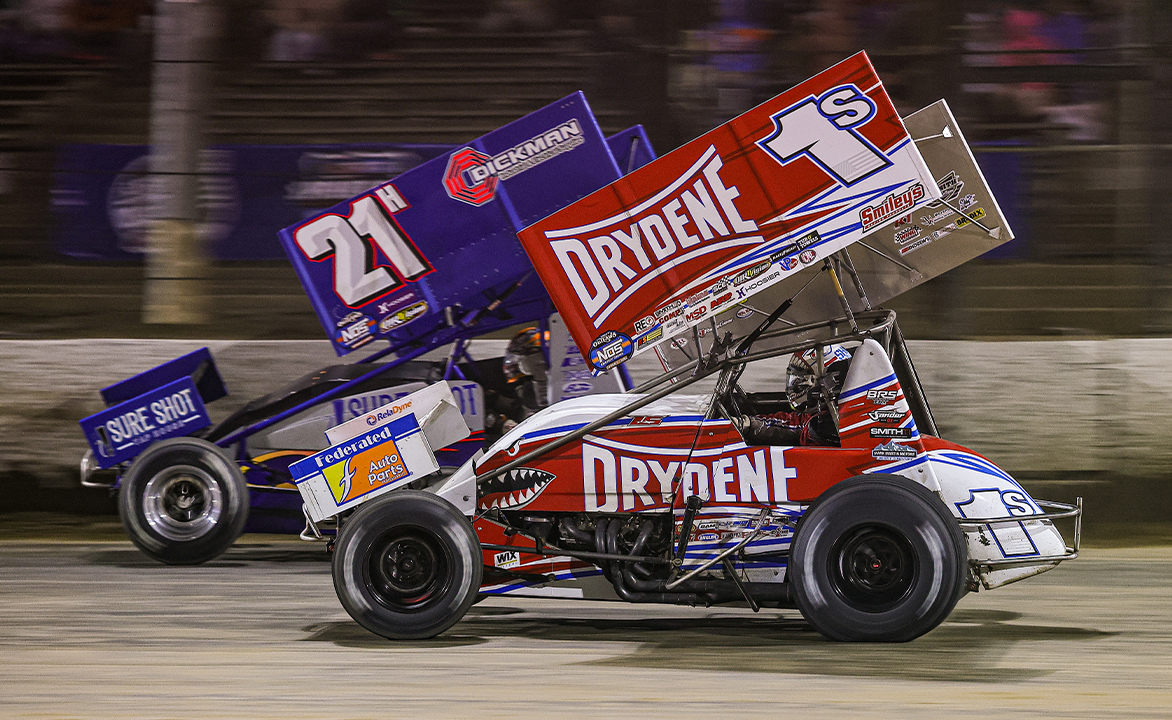 Logan Schuchart races next to Brady Bacon at Eldora Speedway