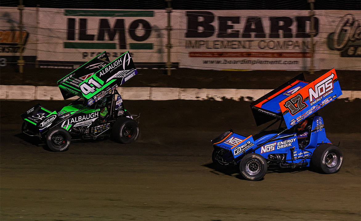 Carson Macedo races ahead of Spencer Bayston at Jacksonville Speedway