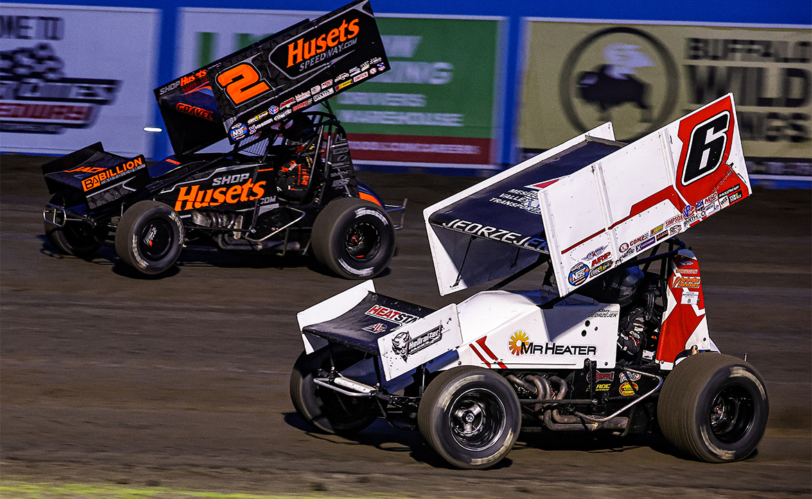 Kasey Jedrzejek races alongside David Gravel at River Cities Speedway