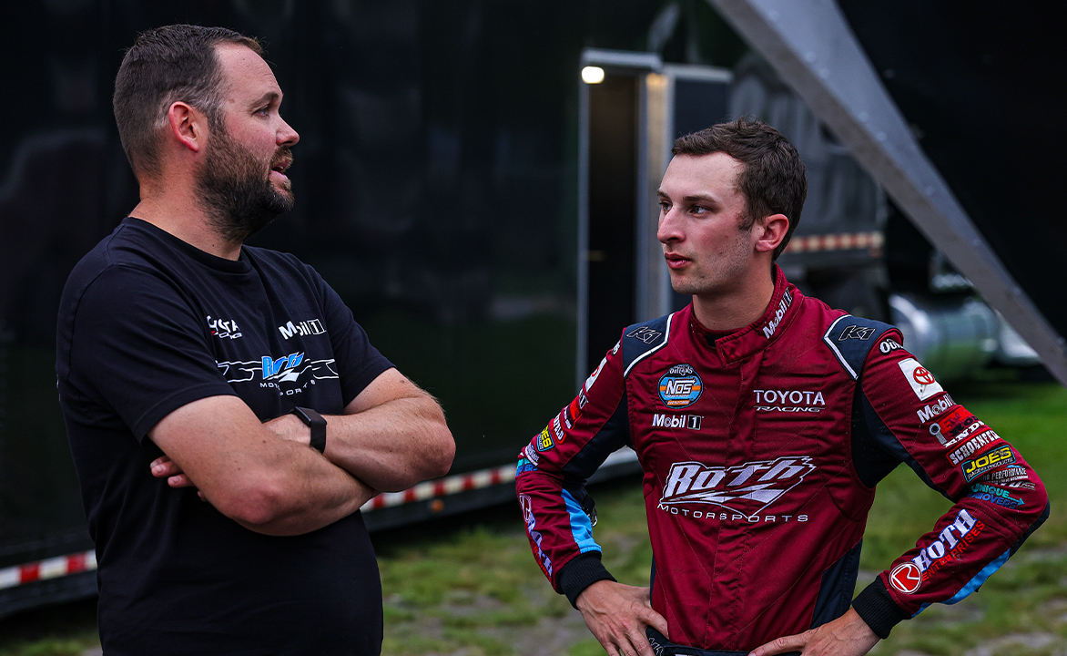 Buddy Kofoid talking to Dylan Buswell