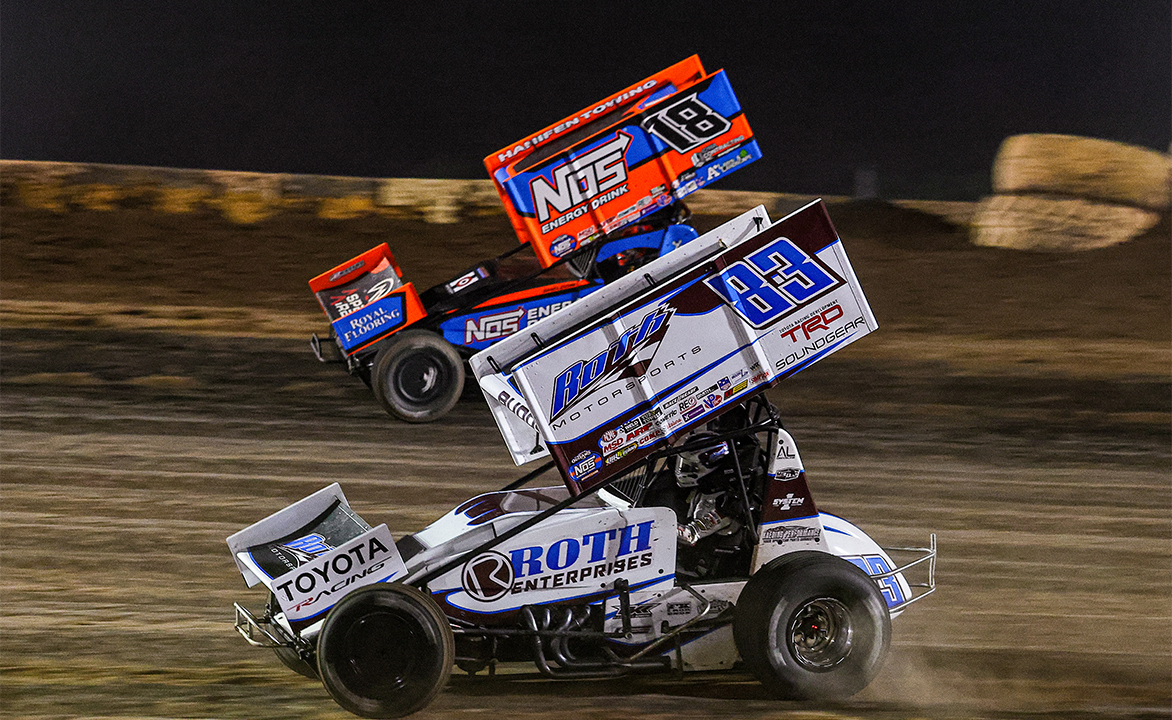 Sheldon Haudenschild races side by side with Buddy Kofoid