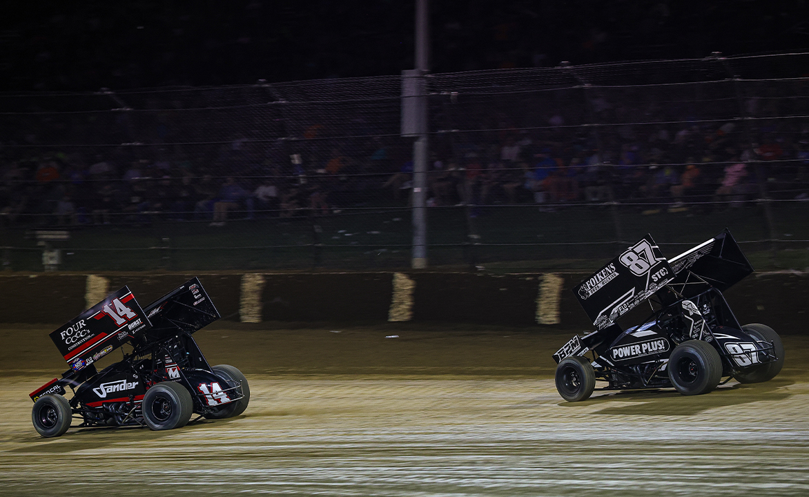 Corey Day races Aaron Reutzel at Eldora Speedway