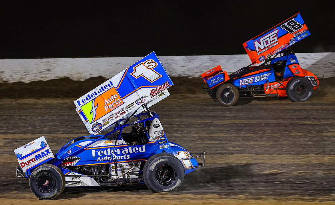 Logan Schuchart and Sheldon Haudenschild racing at Weedsport Speedway